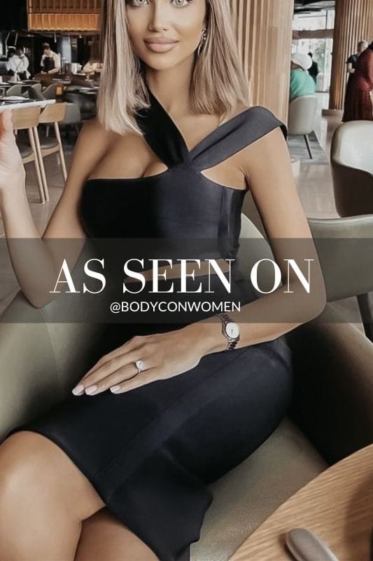 Woman wearing a figure flattering Molly Bandage Midi Dress - Classic Black BODYCON COLLECTION