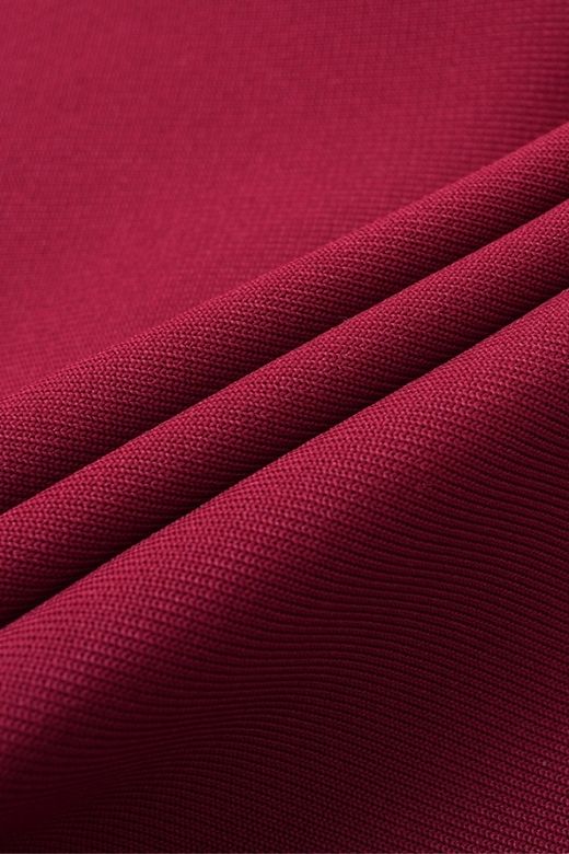 Woman wearing a figure flattering Molly Bandage Midi Dress - Red Wine BODYCON COLLECTION