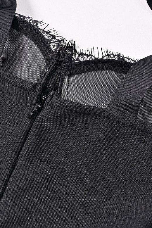 Woman wearing a figure flattering Nora Bandage Midi Dress - Classic Black BODYCON COLLECTION