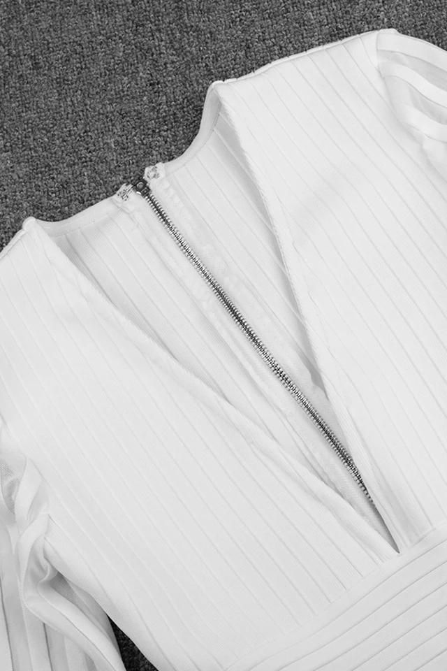 Woman wearing a figure flattering Olivia Long Sleeve Bandage Midi Dress - Pearl White Bodycon Collection