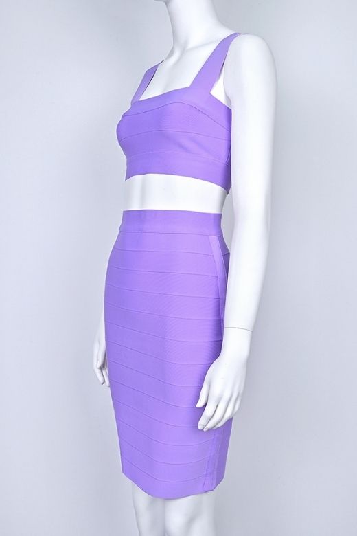 Woman wearing a figure flattering Ophelia Bandage Crop Top and Skirt Set - Violet BODYCON COLLECTION Pty Ltd