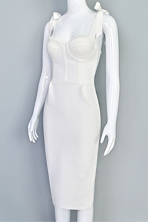 Woman wearing a figure flattering Payton Bandage Dress - Pearl White BODYCON COLLECTION