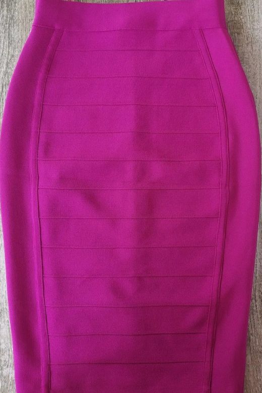 Woman wearing a figure flattering Pencil High Waist Bandage Knee Length Cocktail Skirt - Magenta Pink BODYCON COLLECTION