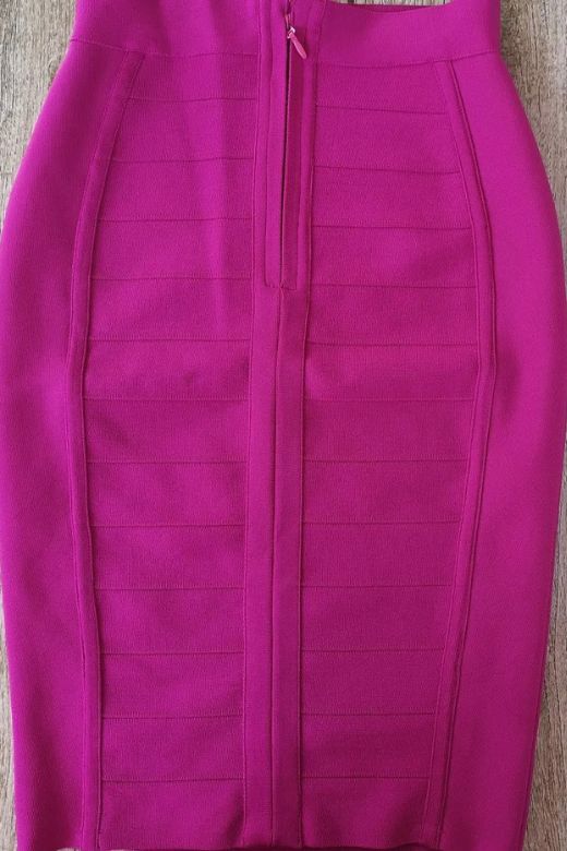 Woman wearing a figure flattering Pencil High Waist Bandage Knee Length Cocktail Skirt - Magenta Pink BODYCON COLLECTION