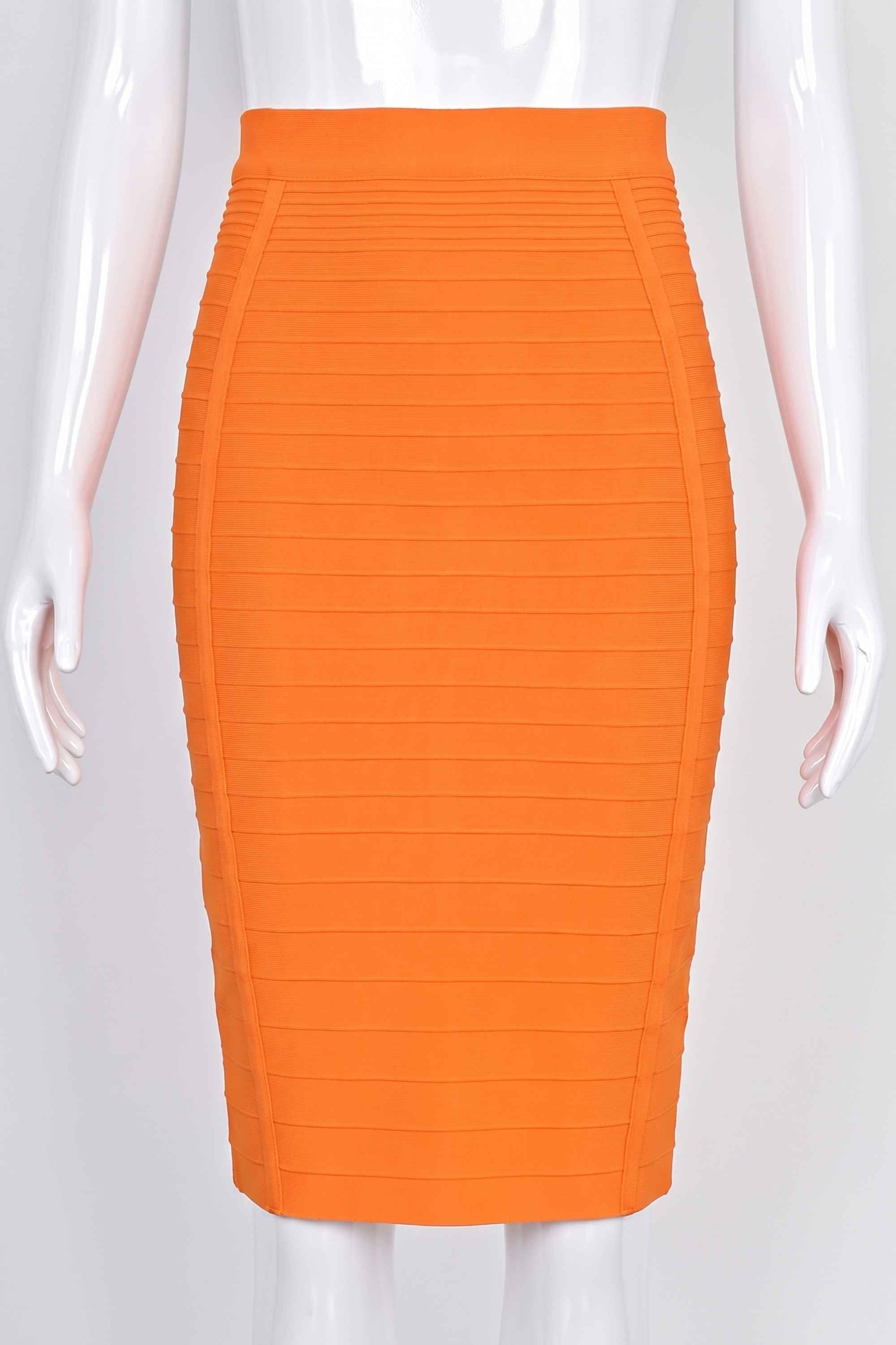 Woman wearing a figure flattering Pencil High Waist Bandage Knee Length Knitted Skirt - Apricot Orange BODYCON COLLECTION
