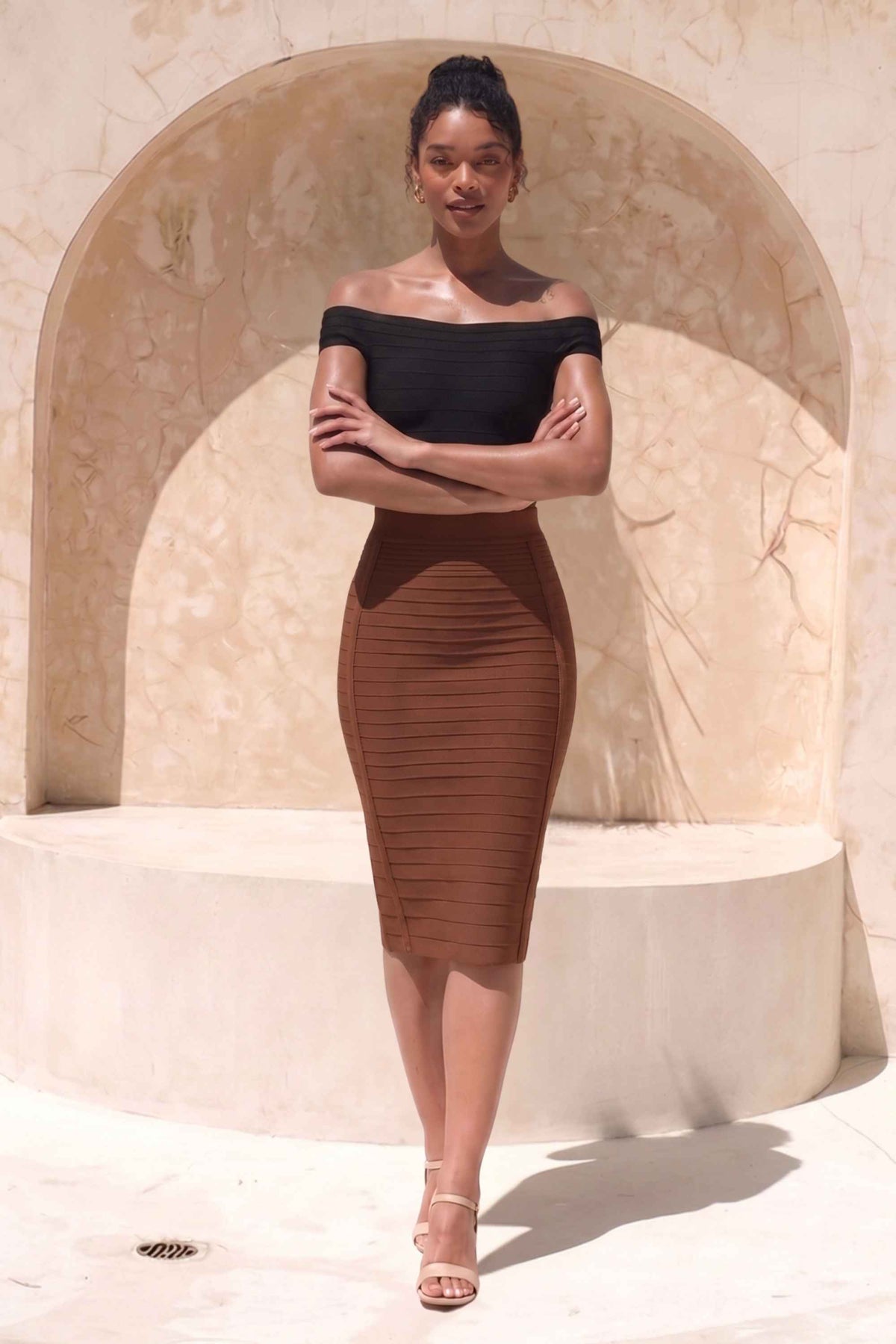 Woman wearing a figure flattering Pencil High Waist Bandage Knee Length Knitted Skirt - Tan Brown BODYCON COLLECTION