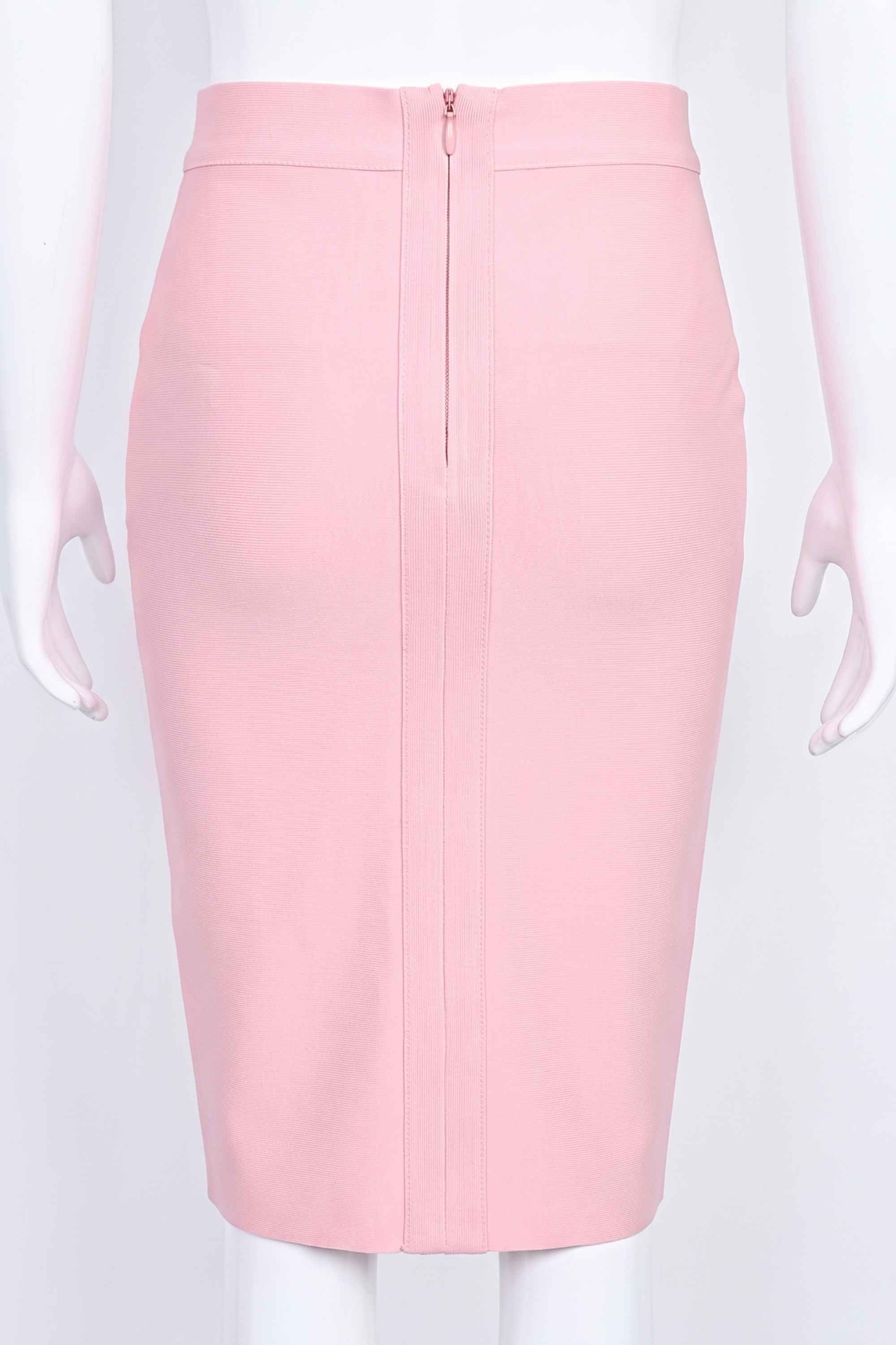 Woman wearing a figure flattering Pencil High Waist Bandage Knee Length Skirt - Blush Pink BODYCON COLLECTION