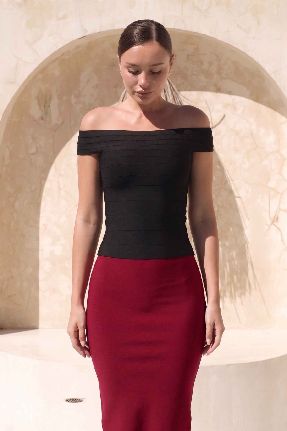 Woman wearing a figure flattering Pencil High Waist Bandage Midi Skirt - Red Wine BODYCON COLLECTION