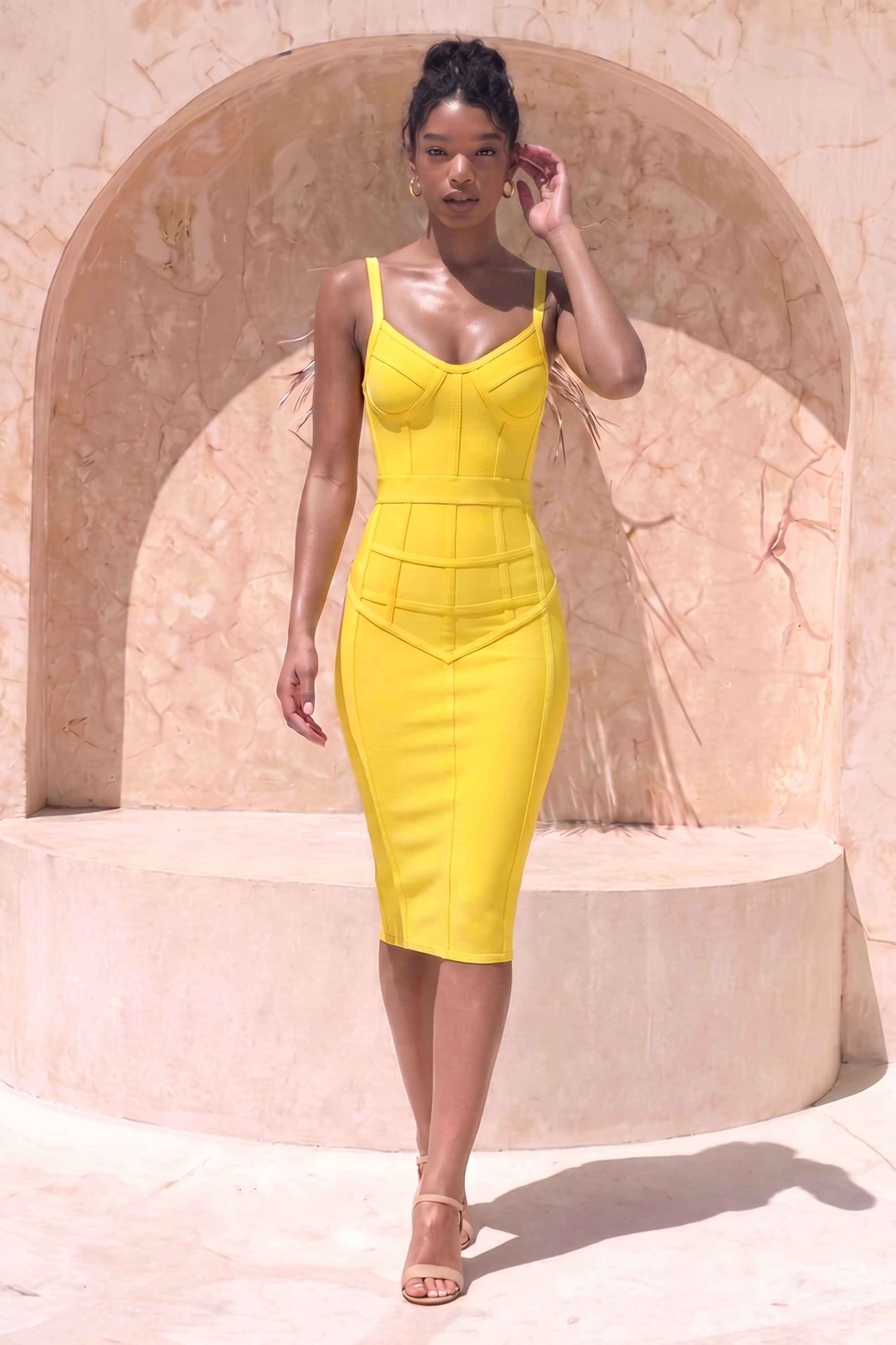 Woman wearing a figure flattering Pip Bandage Corset Dress - Sun Yellow Bodycon Collection