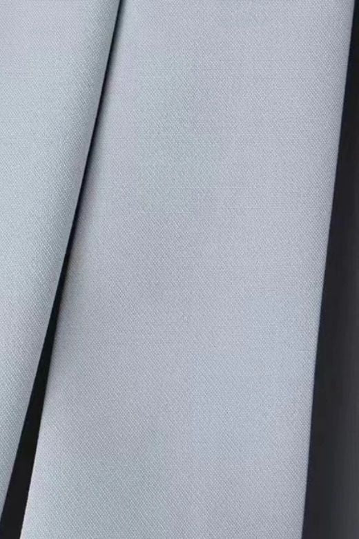 Woman wearing a figure flattering Pleated Sports Mini Skirt - Cloud Grey BODYCON COLLECTION Pty Ltd