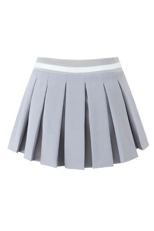 Woman wearing a figure flattering Pleated Sports Mini Skirt - Cloud Grey BODYCON COLLECTION Pty Ltd