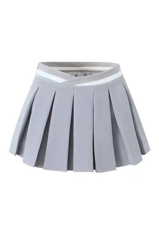 Woman wearing a figure flattering Pleated Sports Mini Skirt - Cloud Grey BODYCON COLLECTION Pty Ltd