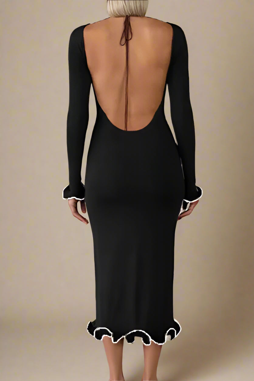Woman wearing a figure flattering Regina Long Sleeve Bodycon Maxi Dress - Classic Black BODYCON COLLECTION