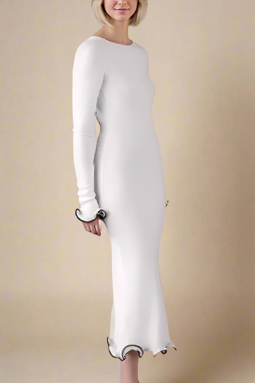 Woman wearing a figure flattering Regina Long Sleeve Bodycon Maxi Dress - Ivory White BODYCON COLLECTION