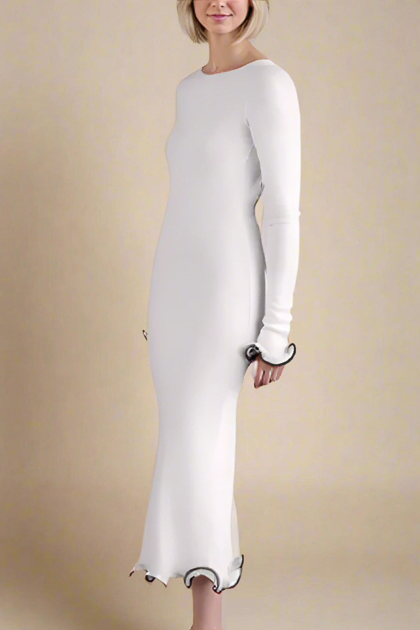 Woman wearing a figure flattering Regina Long Sleeve Bodycon Maxi Dress - Ivory White BODYCON COLLECTION