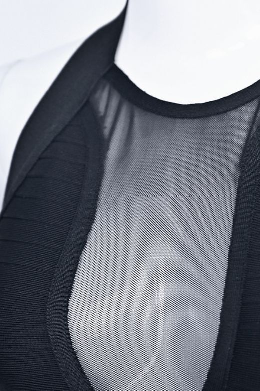 Woman wearing a figure flattering Remi Bandage Mini Dress - Classic Black BODYCON COLLECTION Pty Ltd