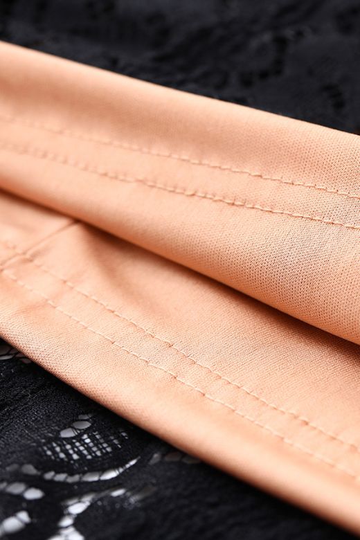 Woman wearing a figure flattering Rose Long Sleeve Bodycon Maxi Dress - Classic Black BODYCON COLLECTION