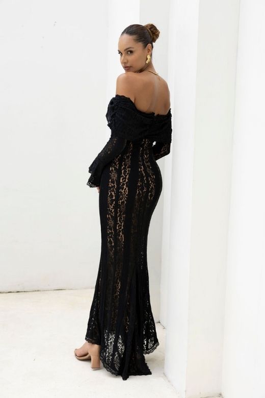 Woman wearing a figure flattering Rose Long Sleeve Bodycon Maxi Dress - Classic Black BODYCON COLLECTION