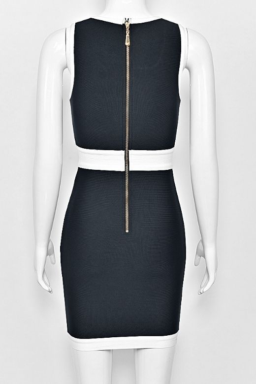 Woman wearing a figure flattering Rosie Bodycon Dress - Classic Black BODYCON COLLECTION