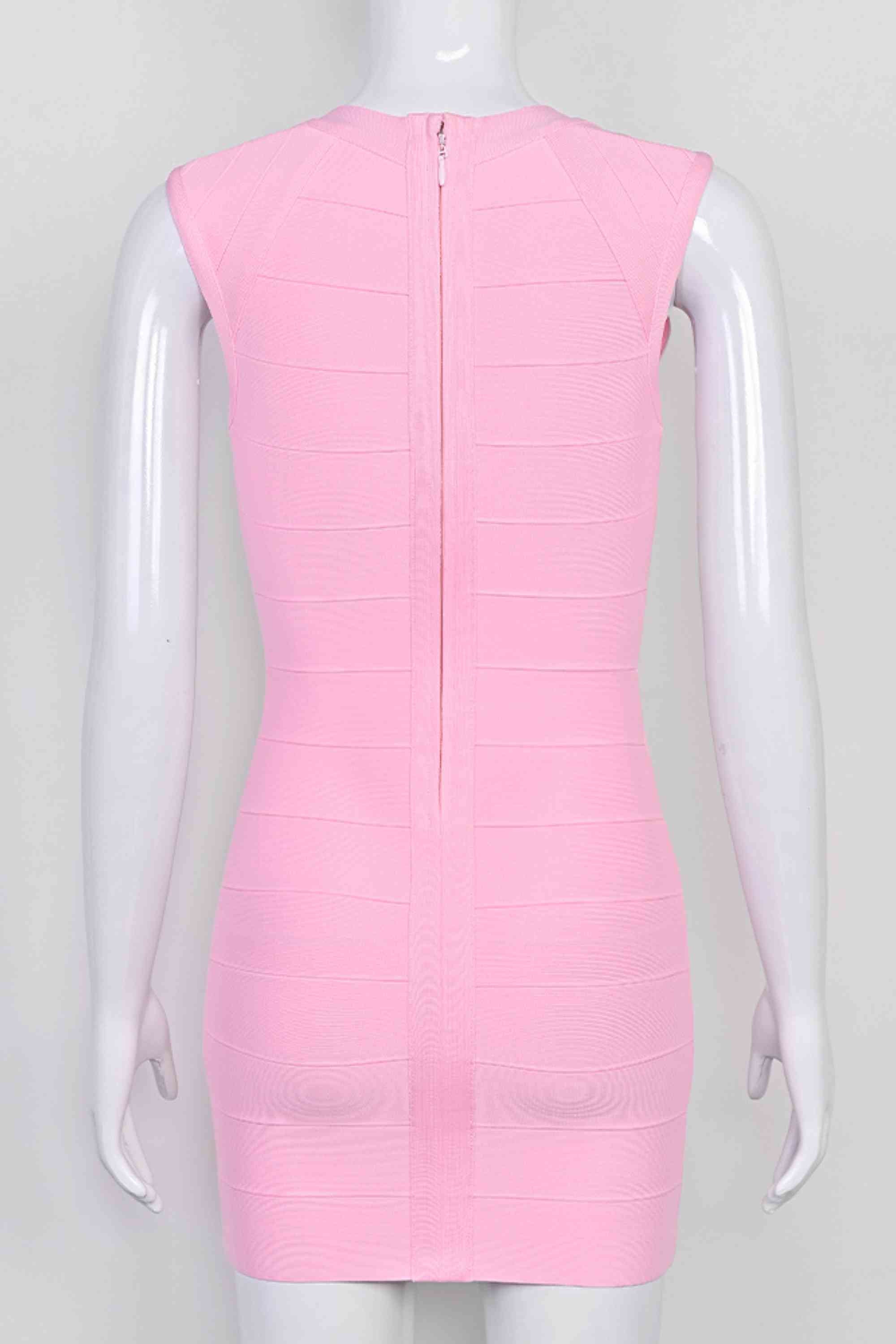 Woman wearing a figure flattering Sabrina Bandage Mini Dress - Dusty Pink BODYCON COLLECTION Pty Ltd