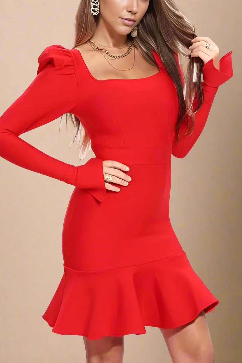 Woman wearing a figure flattering Sara Bodycon Long Sleeve Mini Dress - Lipstick Red BODYCON COLLECTION