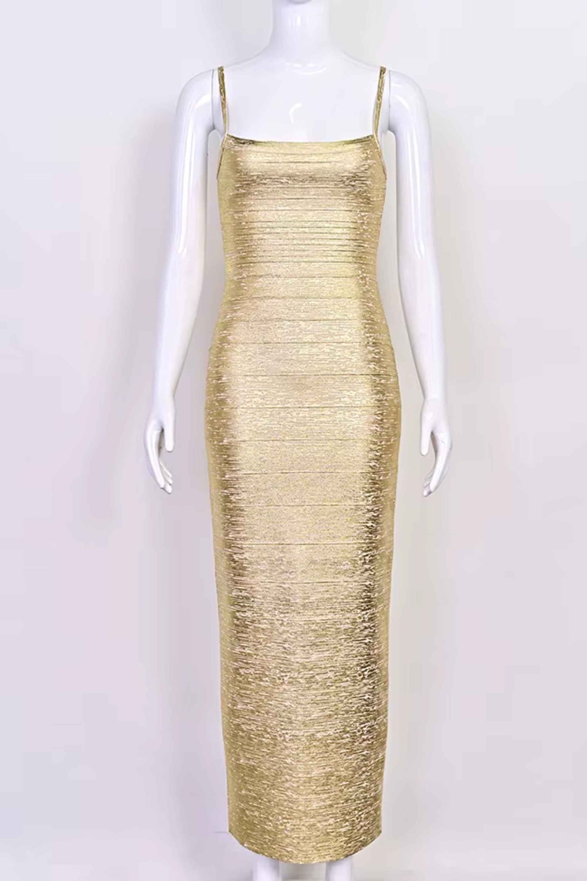 Woman wearing a figure flattering Scarlett Bandage Maxi Dress - Gold BODYCON COLLECTION Pty Ltd