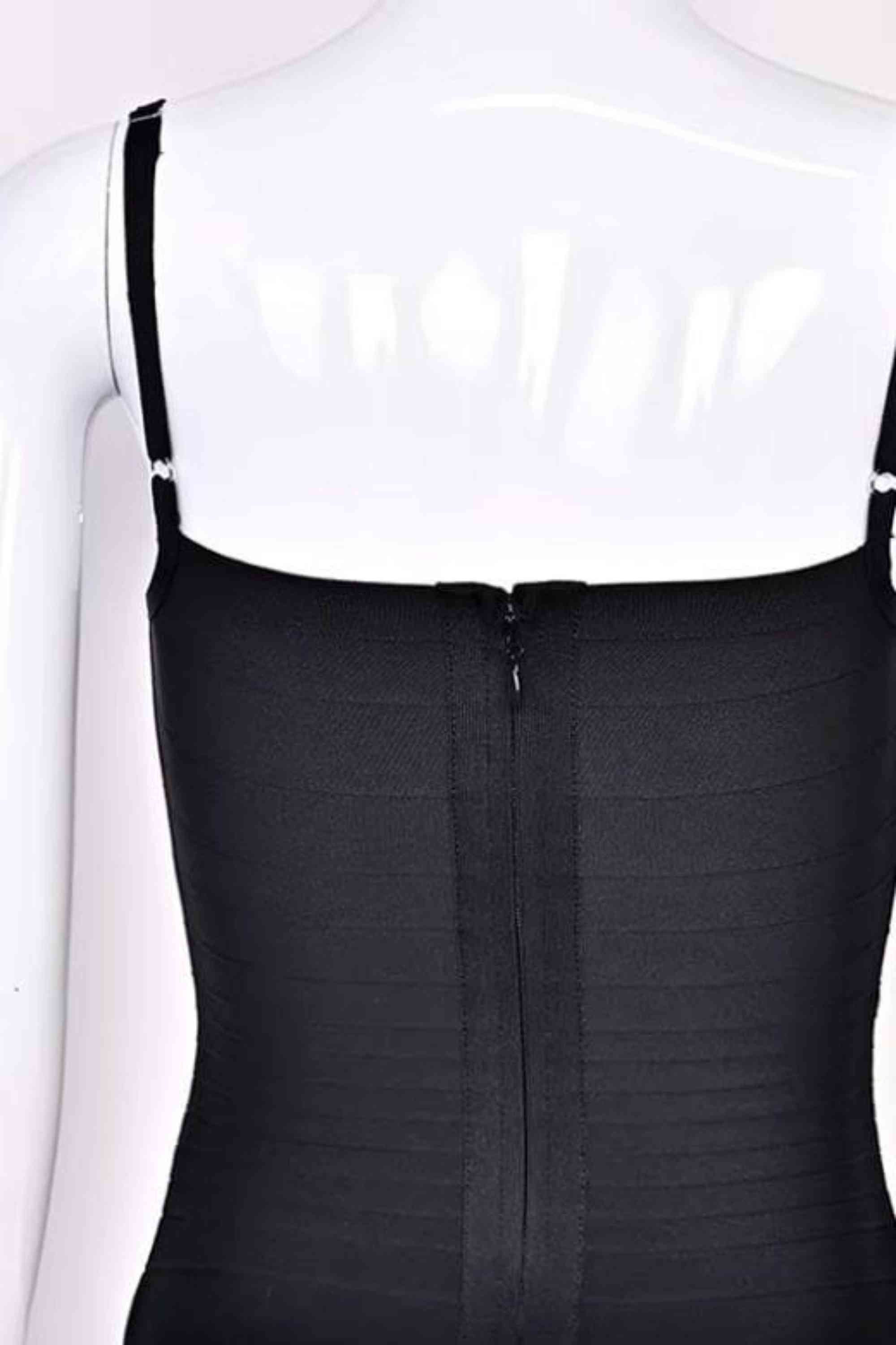 Woman wearing a figure flattering Scarlett Bandage Mini Dress - Classic Black BODYCON COLLECTION Pty Ltd