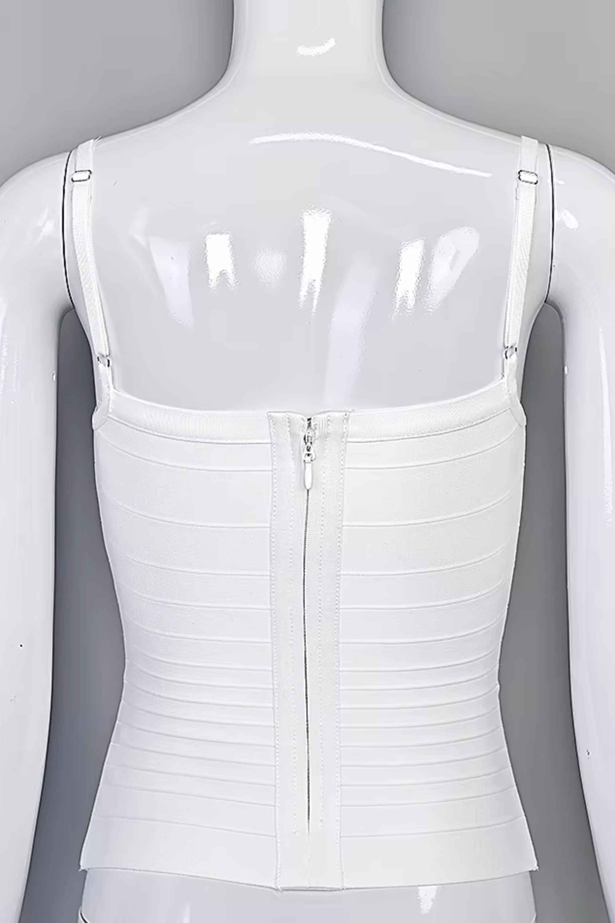 Woman wearing a figure flattering Scarlett Bandage Tank Top - White Pearl BODYCON COLLECTION Pty Ltd