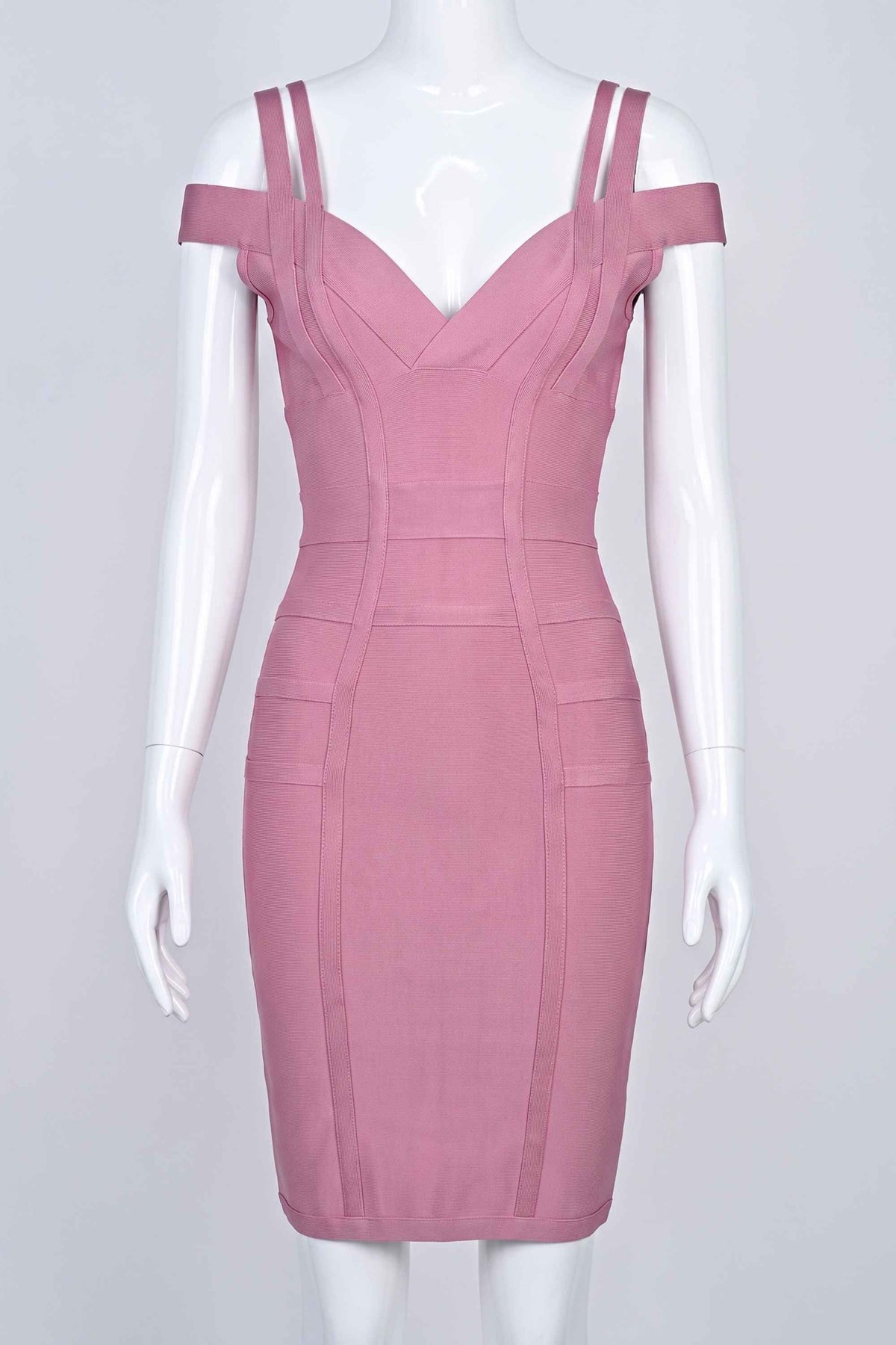 Woman wearing a figure flattering Sia Bandage Dress - Ballet Pink Bodycon Collection