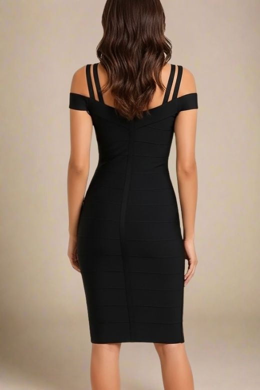 Woman wearing a figure flattering Sia Bandage Dress - Classic Black Bodycon Collection