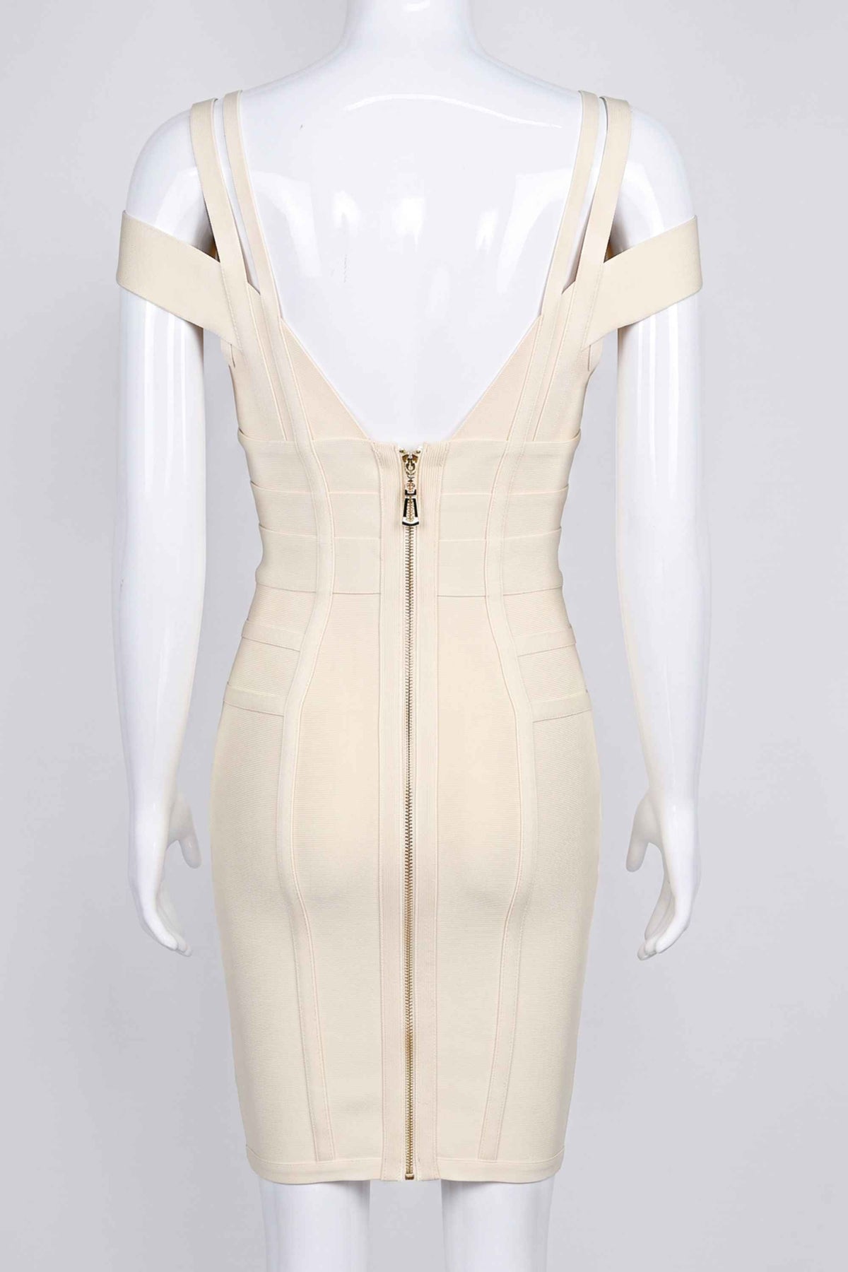 Woman wearing a figure flattering Sia Bandage Dress - Cream Bodycon Collection