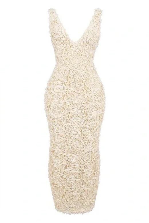 Woman wearing a figure flattering Sonia Bodycon Maxi Dress - Pearl White BODYCON COLLECTION
