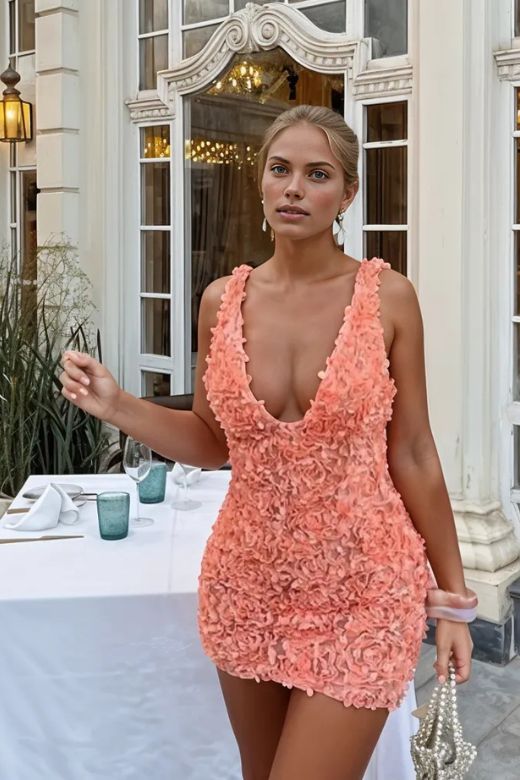 Woman wearing a figure flattering Sonia Bodycon Mini Dress - Apricot Orange BODYCON COLLECTION