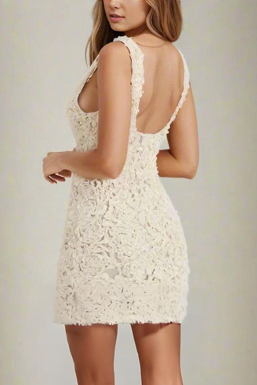 Woman wearing a figure flattering Sonia Bodycon Mini Dress - White Pearl BODYCON COLLECTION