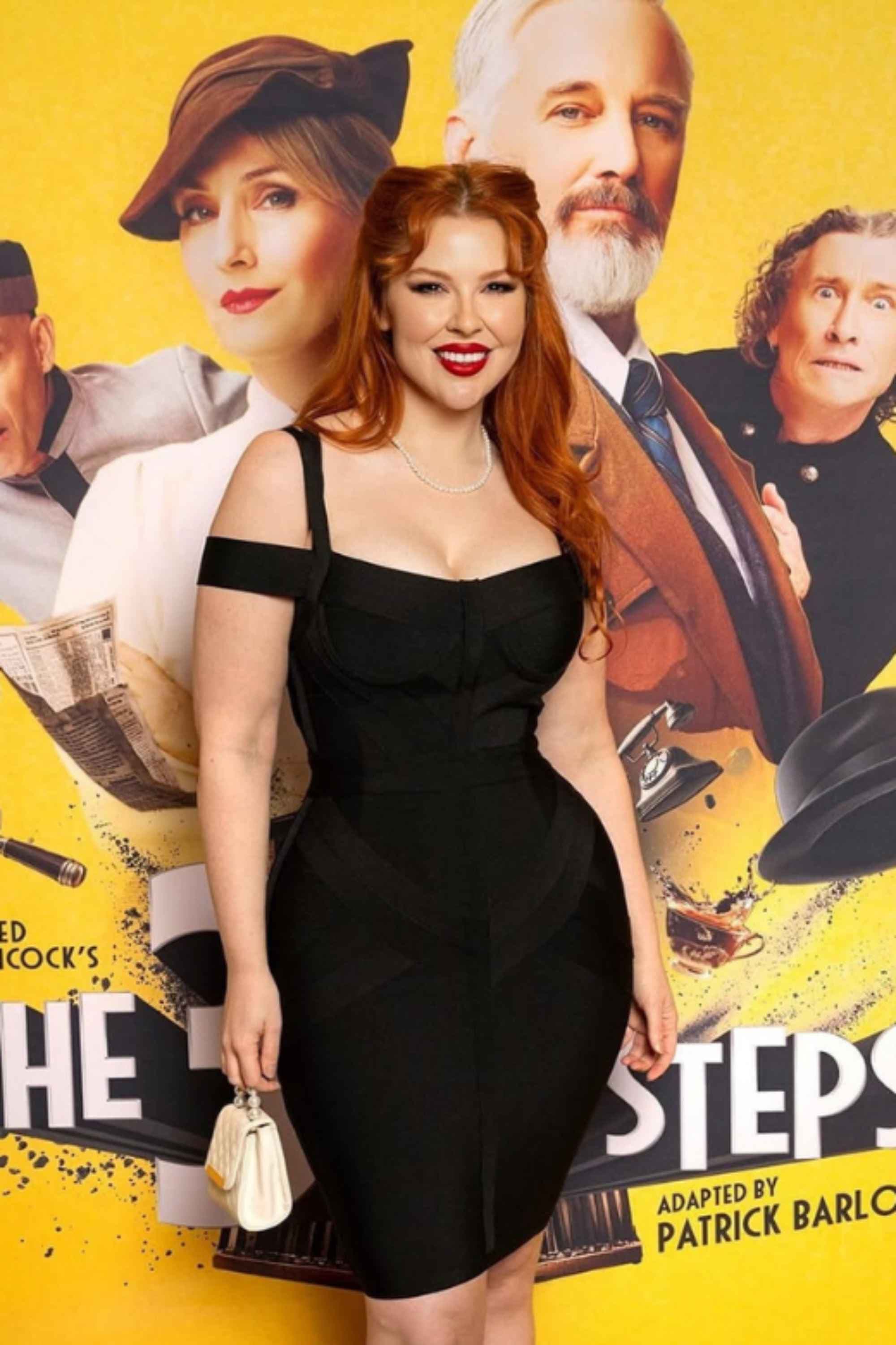Woman wearing a figure flattering Sophia Bandage Dress - Lipstick Red Bodycon Collection