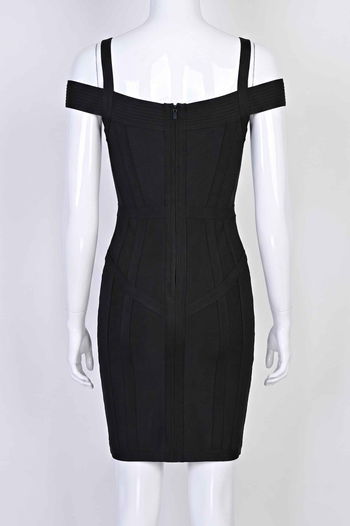 Woman wearing a figure flattering Sophia Bandage Mini Dress - Classic Black Bodycon Collection