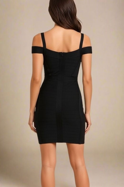 Woman wearing a figure flattering Sophia Bandage Mini Dress - Classic Black Bodycon Collection