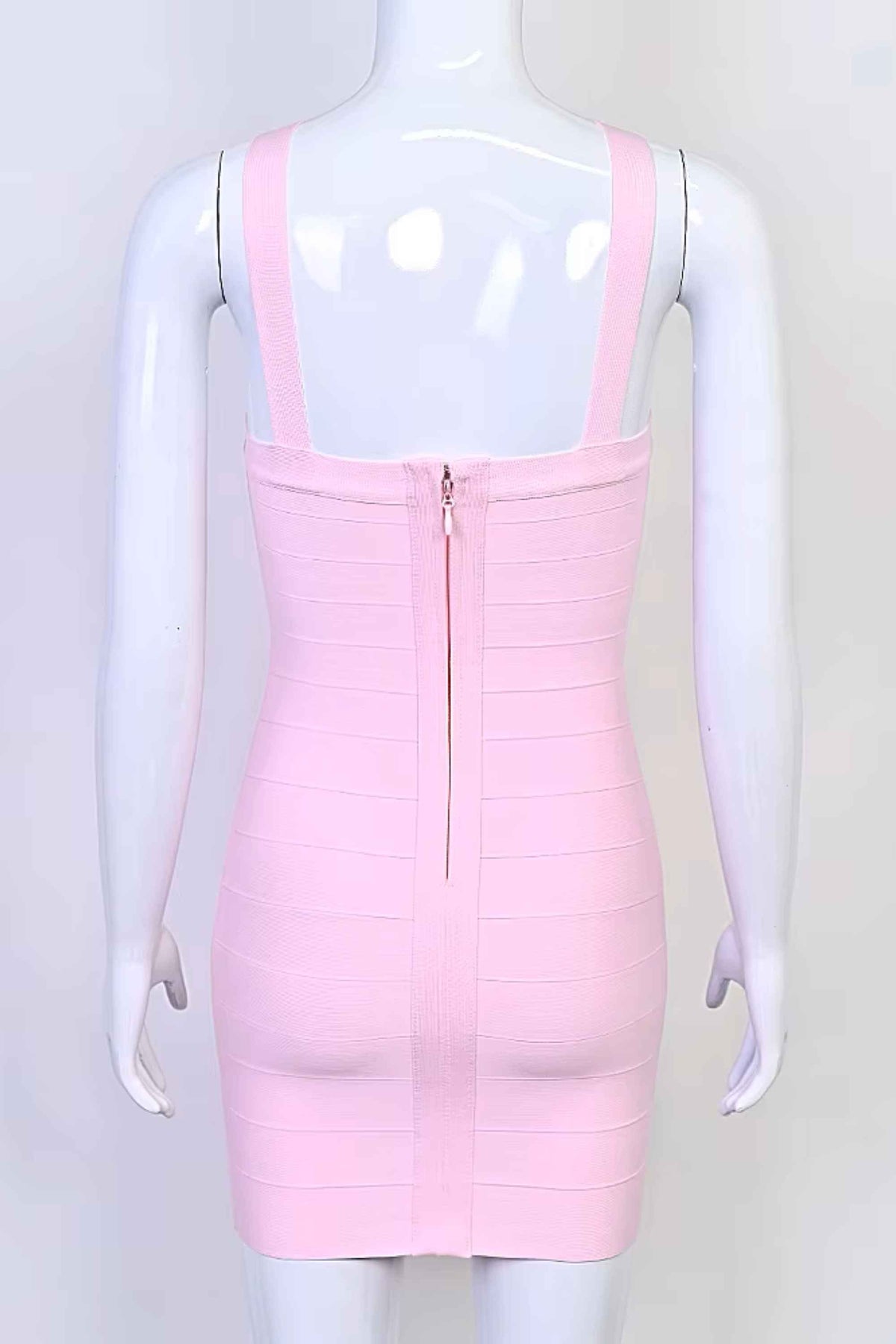 Woman wearing a figure flattering Sydney Bandage Mini Dress - Dusty Pink BODYCON COLLECTION Pty Ltd