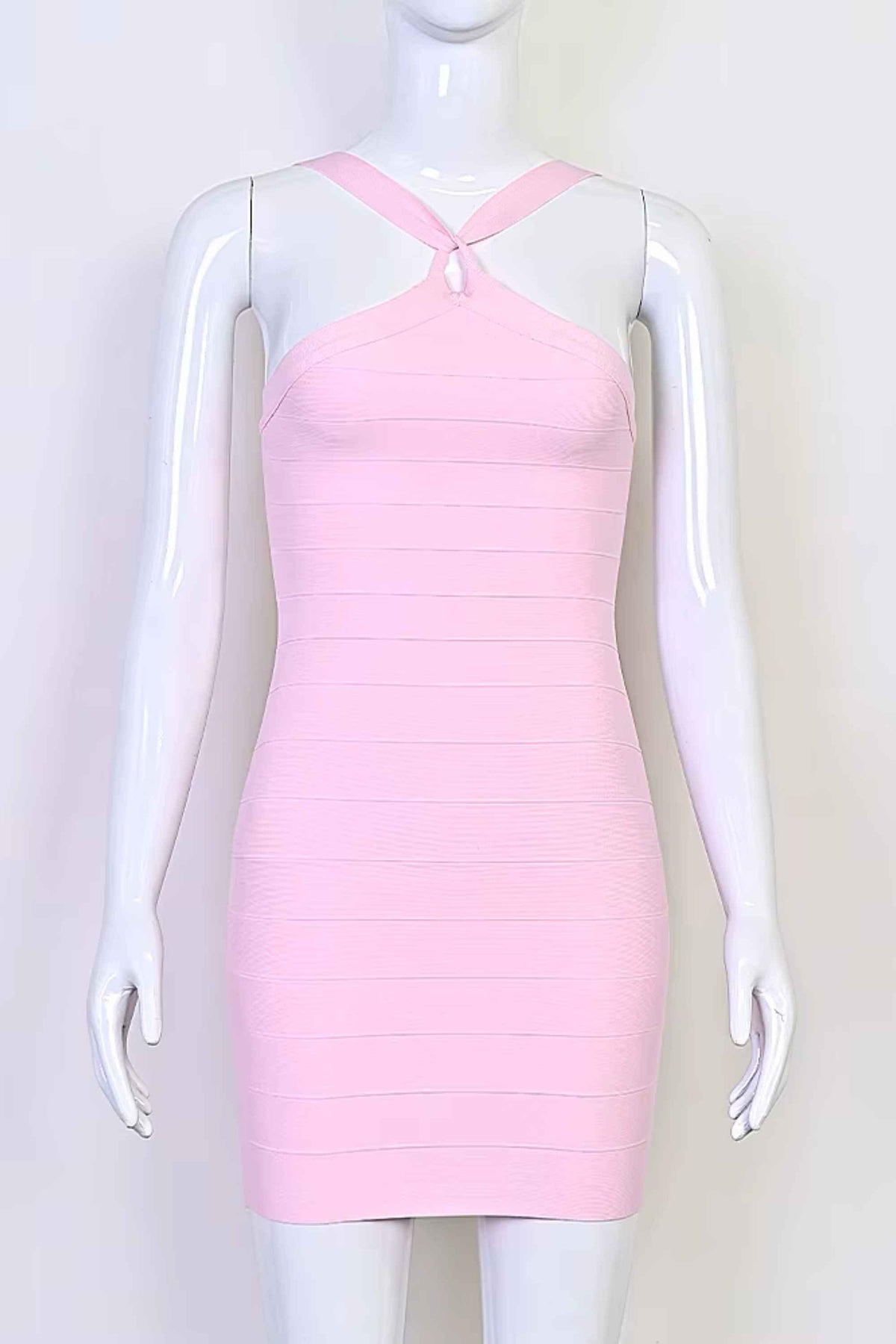 Woman wearing a figure flattering Sydney Bandage Mini Dress - Dusty Pink BODYCON COLLECTION Pty Ltd