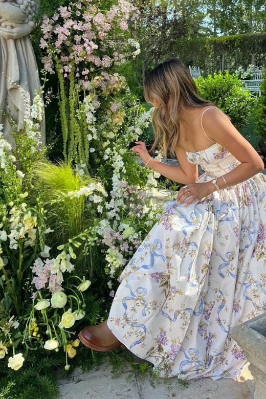 Woman wearing a figure flattering Tasmin Bodycon Midi Dress - Beige Cream BODYCON COLLECTION