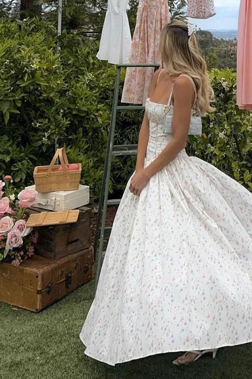 Woman wearing a figure flattering Tasmin Bodycon Midi Dress - Sky Blue BODYCON COLLECTION