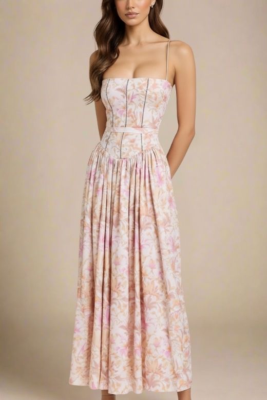 Woman wearing a figure flattering  Tasmin Midi Dress - Pink Print BODYCON COLLECTION