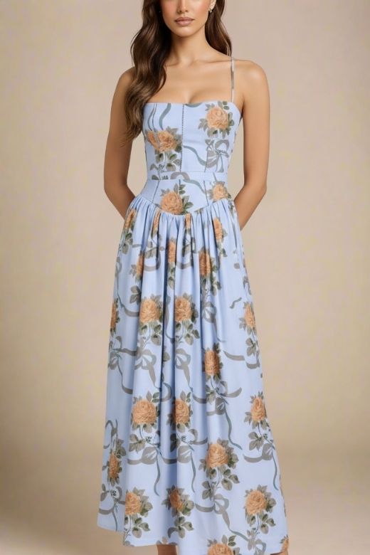 Woman wearing a figure flattering Tasmin Midi Dress - Sky Blue BODYCON COLLECTION