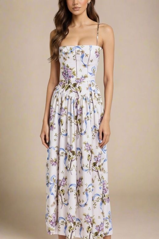 Woman wearing a figure flattering Tasmin Midi Dress - White Floral BODYCON COLLECTION