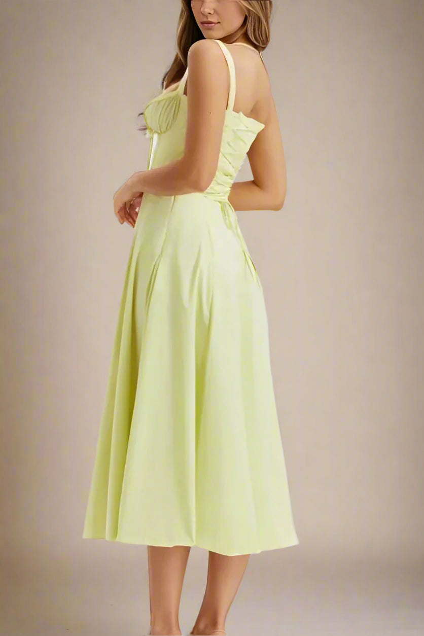 Woman wearing a figure flattering Taylor Bodycon Day Midi Dress - Sun Yellow BODYCON COLLECTION