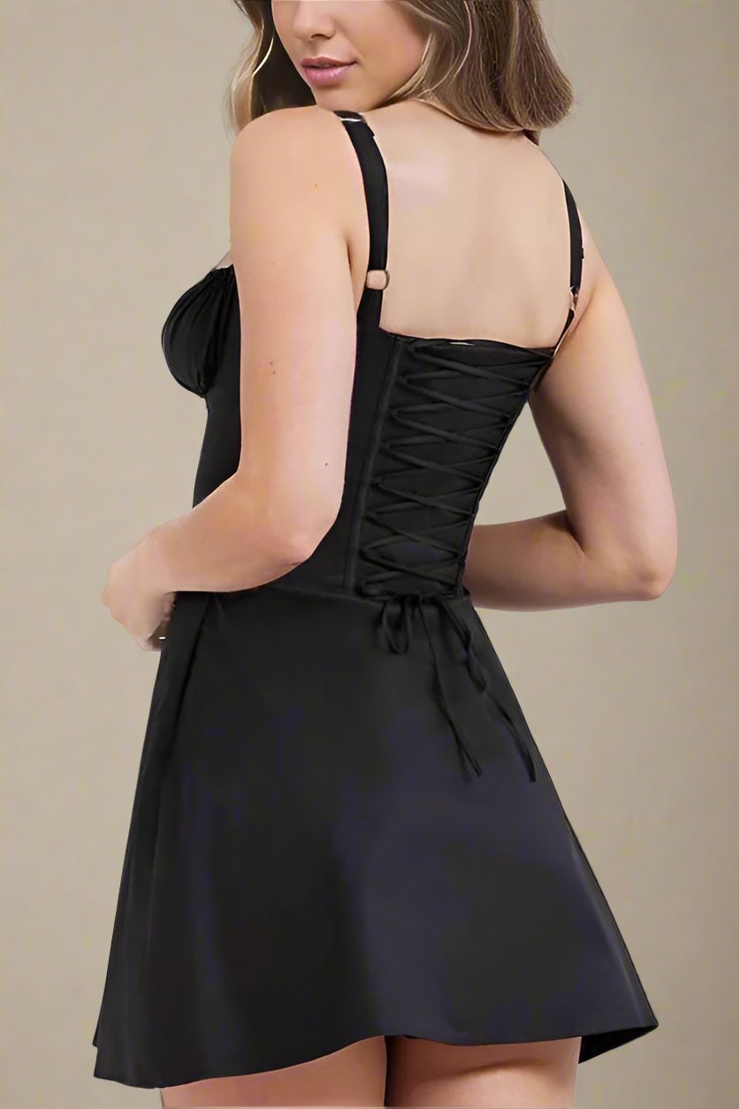 Woman wearing a figure flattering Taylor Bodycon Day Mini Dress - Classic Black BODYCON COLLECTION