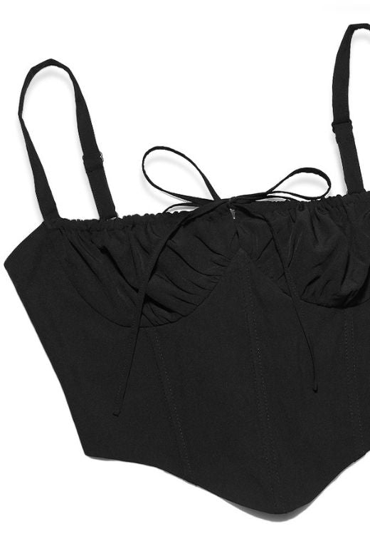 Woman wearing a figure flattering Taylor Corset Crop Top - Classic Black BODYCON COLLECTION