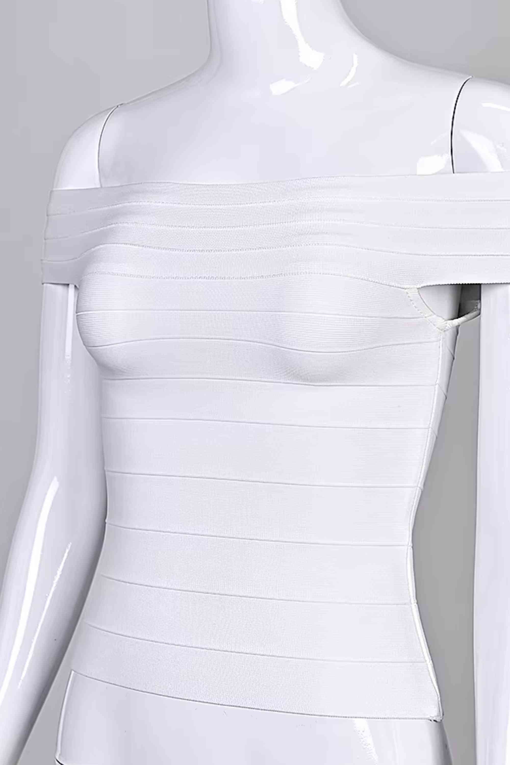 Woman wearing a figure flattering Vera Bandage Off Shoulder Top - White Pearl BODYCON COLLECTION Pty Ltd