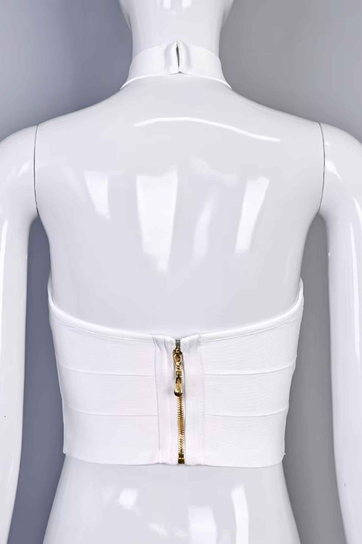 Woman wearing a figure flattering Willow Bandage Crop Top - White Pearl BODYCON COLLECTION Pty Ltd