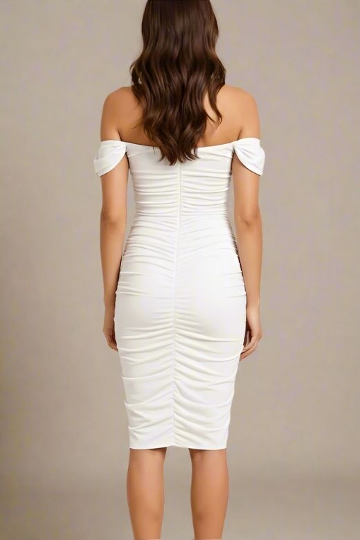 Woman wearing a figure flattering Zia Bodycon Wrap Dress - White Pearl Bodycon Collection